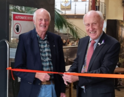 Richmond Rotary President John Morton (right) opening the Charity Art Exhibition at The Station, Richmond, watched by organiser Richard Gibson.